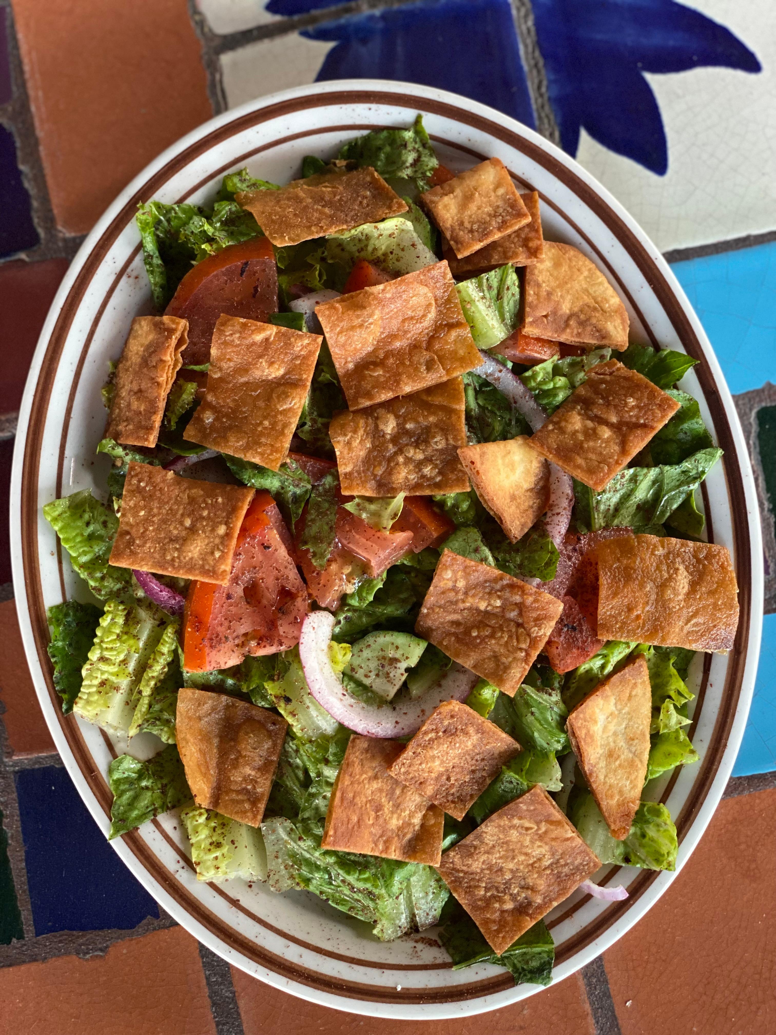 Order Fattoush Salad food online from Dallah Mediterranean Cuisine store, San Antonio on bringmethat.com