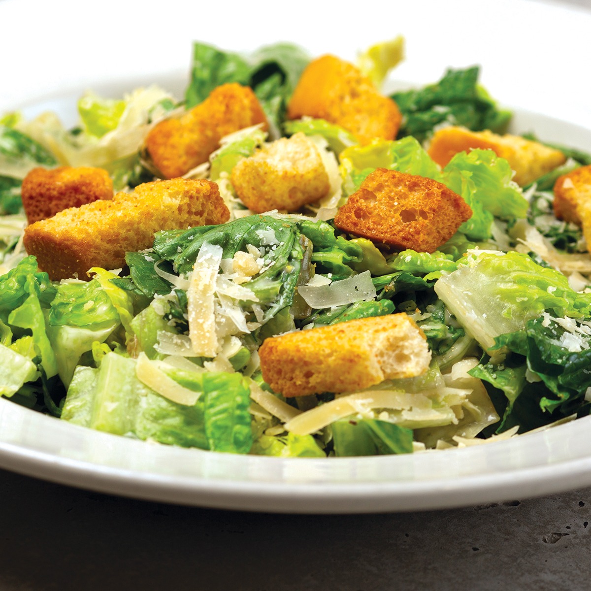 Order Caesar Salad food online from Brixx Wood Fired Pizza store, Wilmington on bringmethat.com