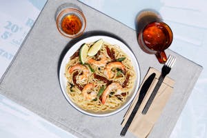 Order Aglio Olio Chicken food online from Yellow Cab Pizza Co. store, Houston on bringmethat.com