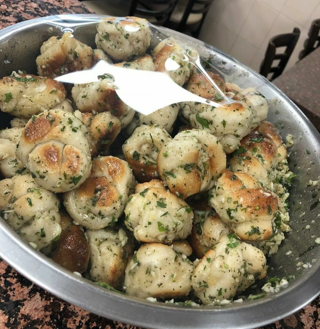 Order Garlic Knots - 3 Pieces food online from Gino's Pizzeria store, Staten Island on bringmethat.com