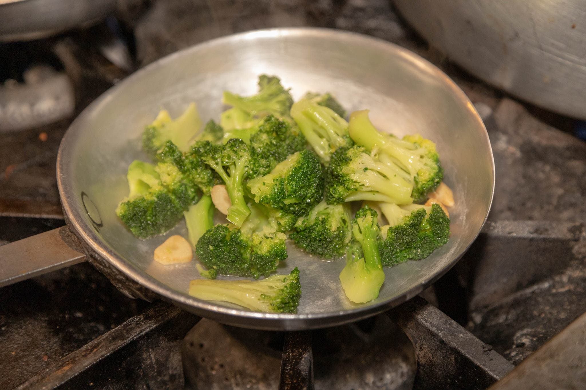 Order Sauteed Broccoli - Side food online from Gino's Pizzeria store, Jersey City on bringmethat.com