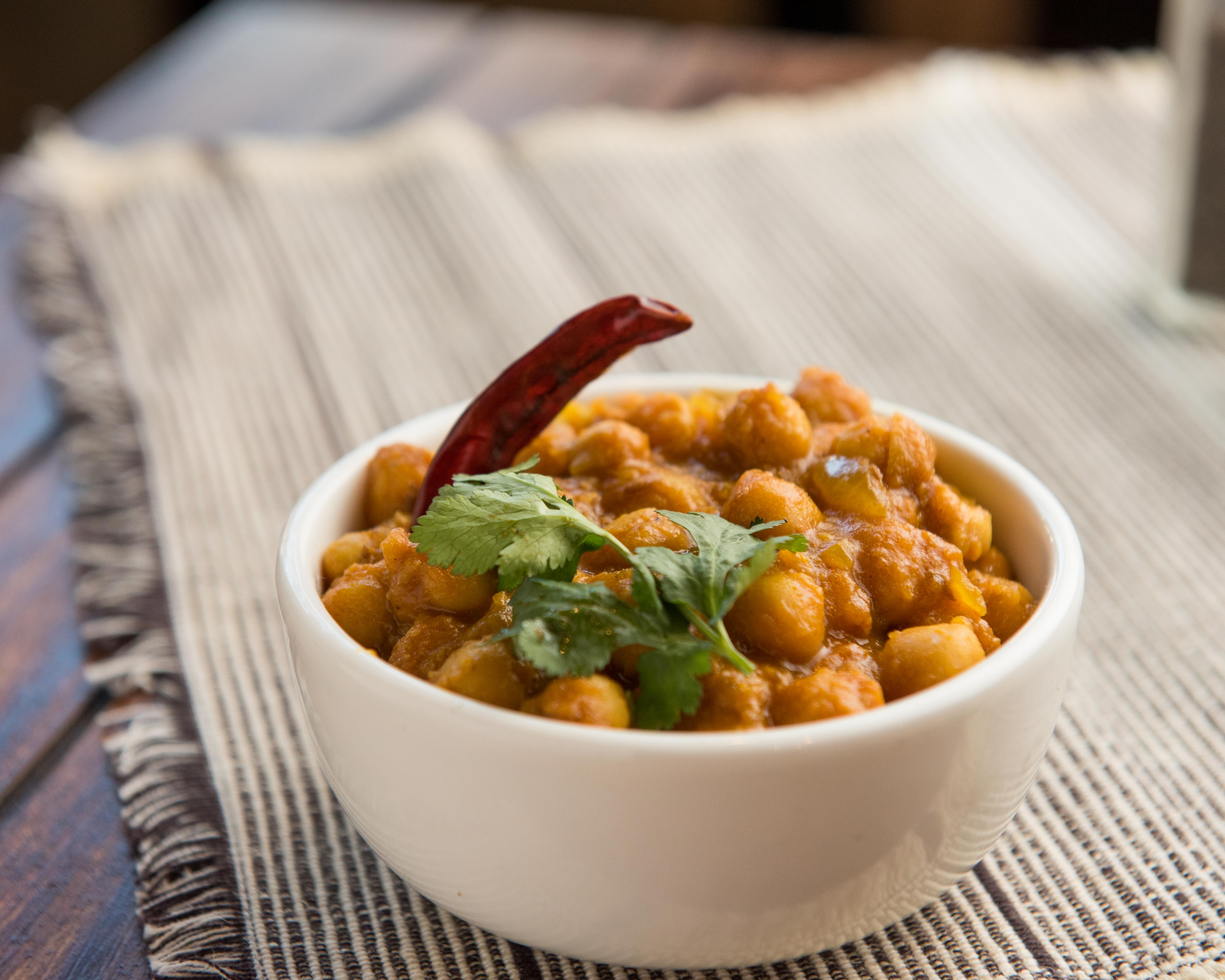 Order Chana Masala food online from Mint Indian Eatery store, Somerville on bringmethat.com