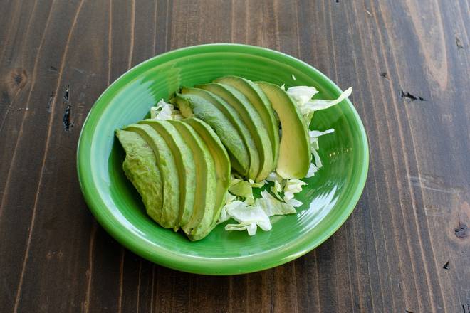 Order Sliced Avocado food online from Blue Goose Cantina store, Mckinney on bringmethat.com