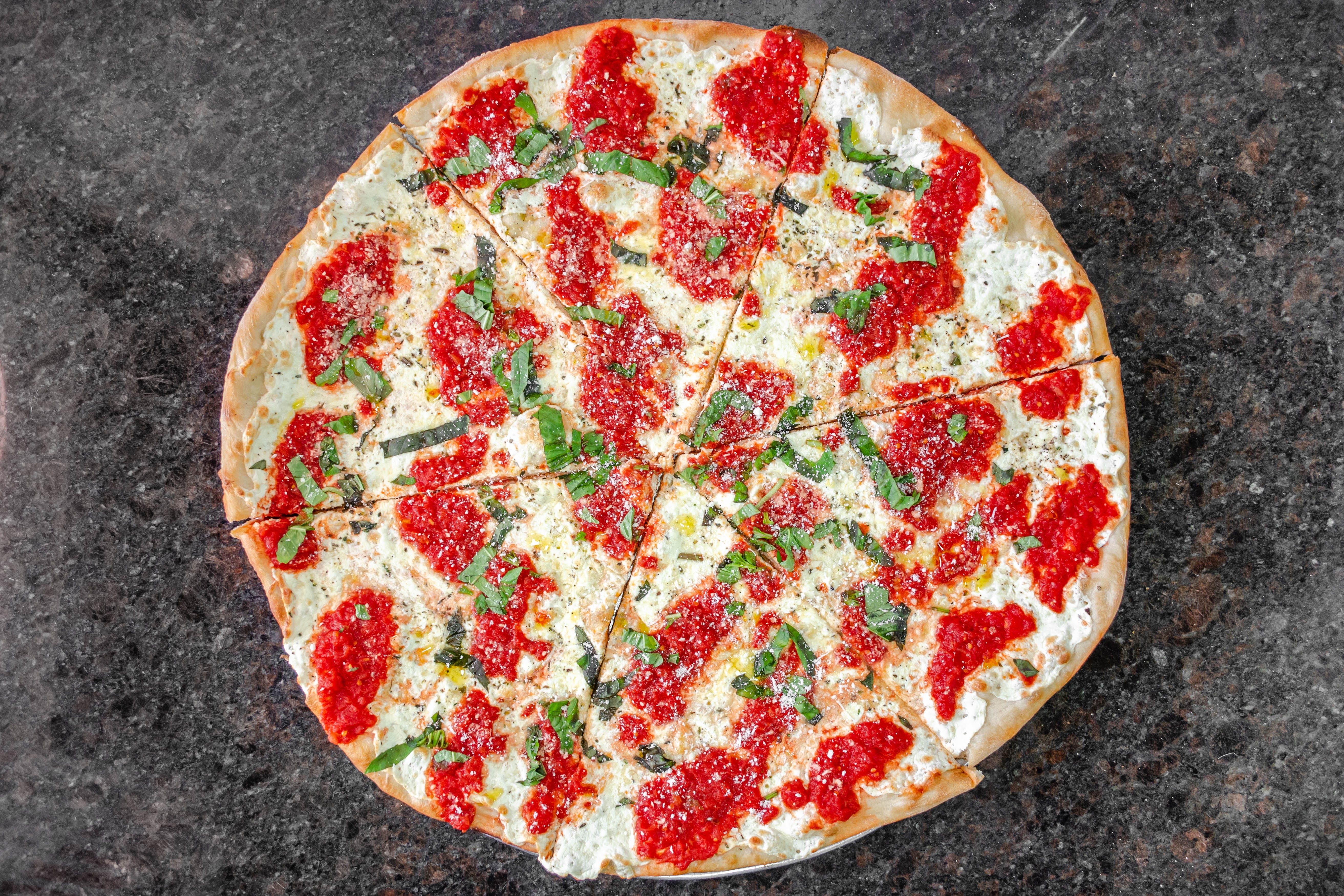 Order Margherita Pizza - Small 14'' (6 Slices) food online from Justino's Pizza store, New York on bringmethat.com