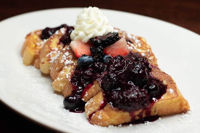Order Triple Berry French Toast food online from Village Inn store, Fremont on bringmethat.com