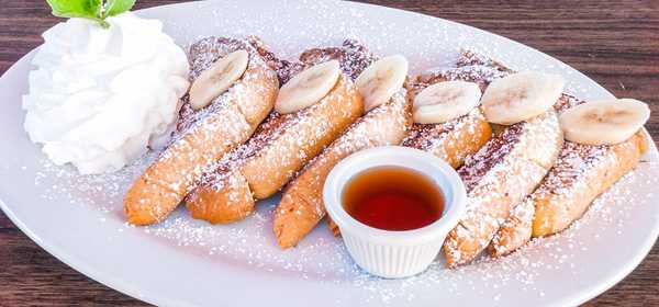 Order Cinnamon French Toast food online from Olympus Caffe & Bakery store, Mountain View on bringmethat.com