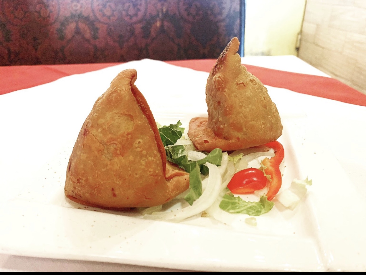 Order 2 Pieces Vegetable Samosa food online from Desi grill store, Brooklyn on bringmethat.com