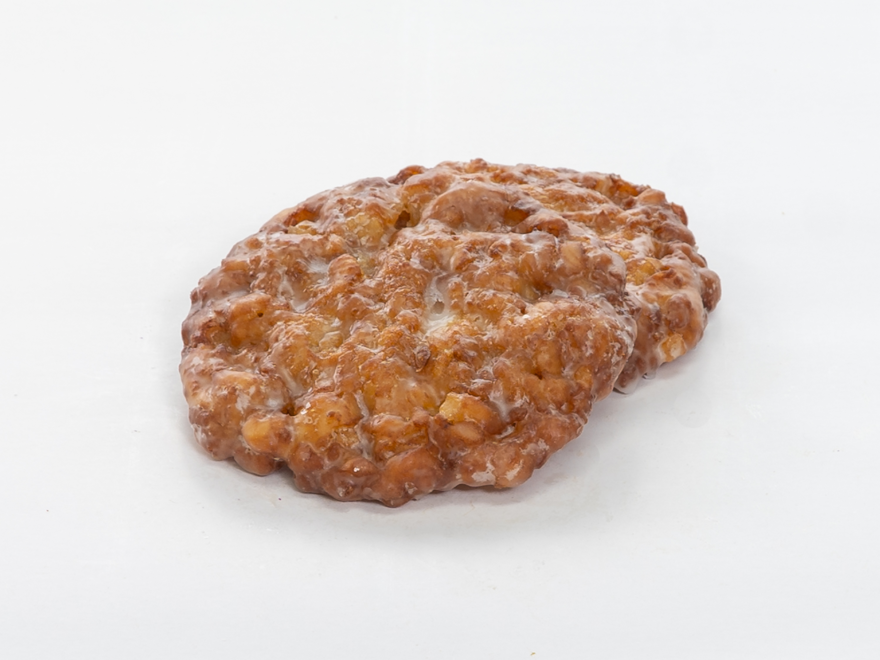 Order Apple Fritter food online from Moon's Donuts store, Irving on bringmethat.com