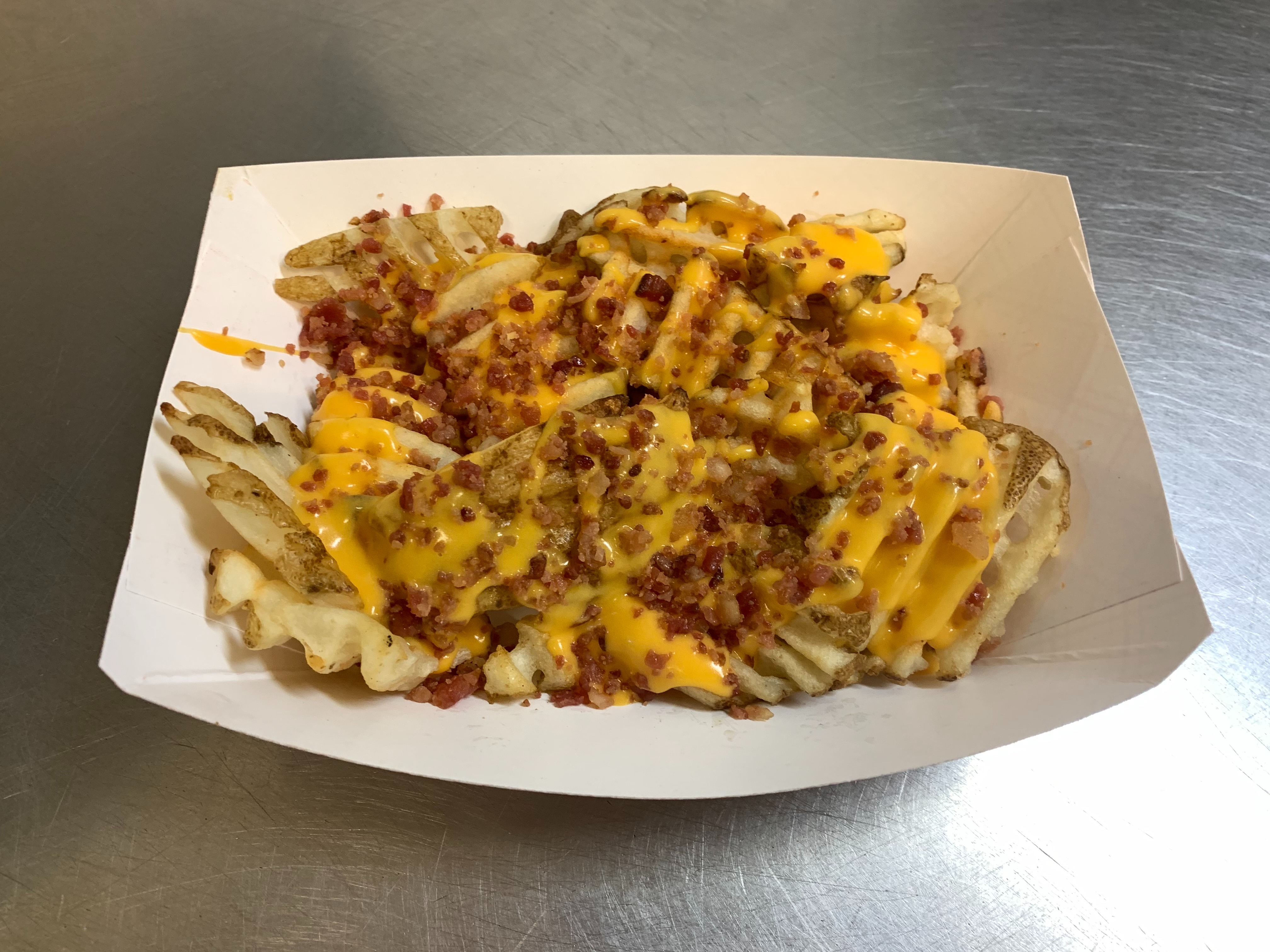Order Bacon Cheddar Fries food online from Lieber Boxcar Express store, Galesburg on bringmethat.com
