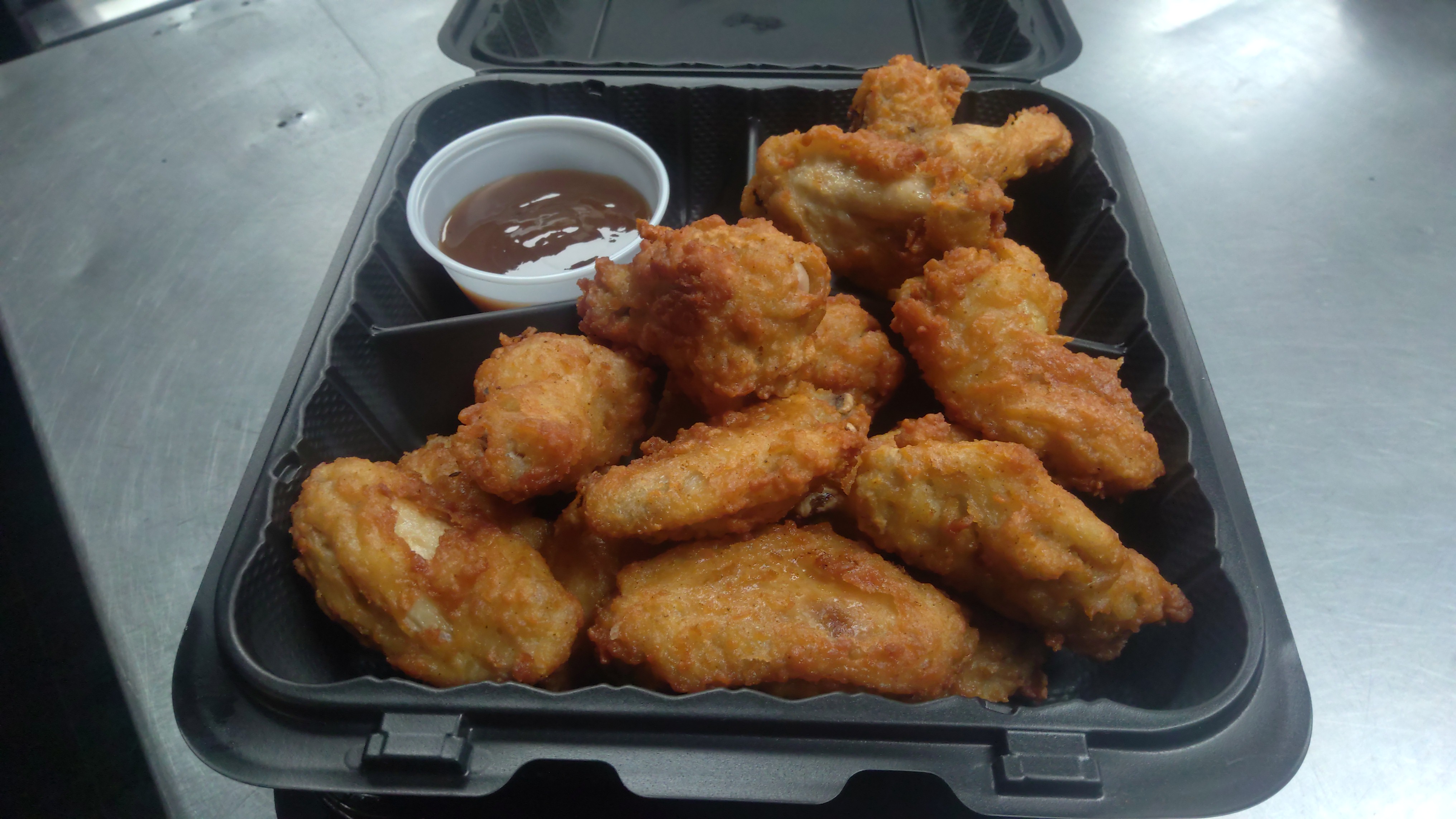 Order 10 Wings food online from Africana Cuisine store, Perry Hall on bringmethat.com