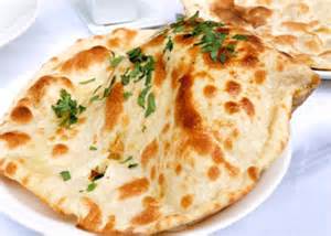 Order Butter Naan food online from Gourmet India store, Houston on bringmethat.com
