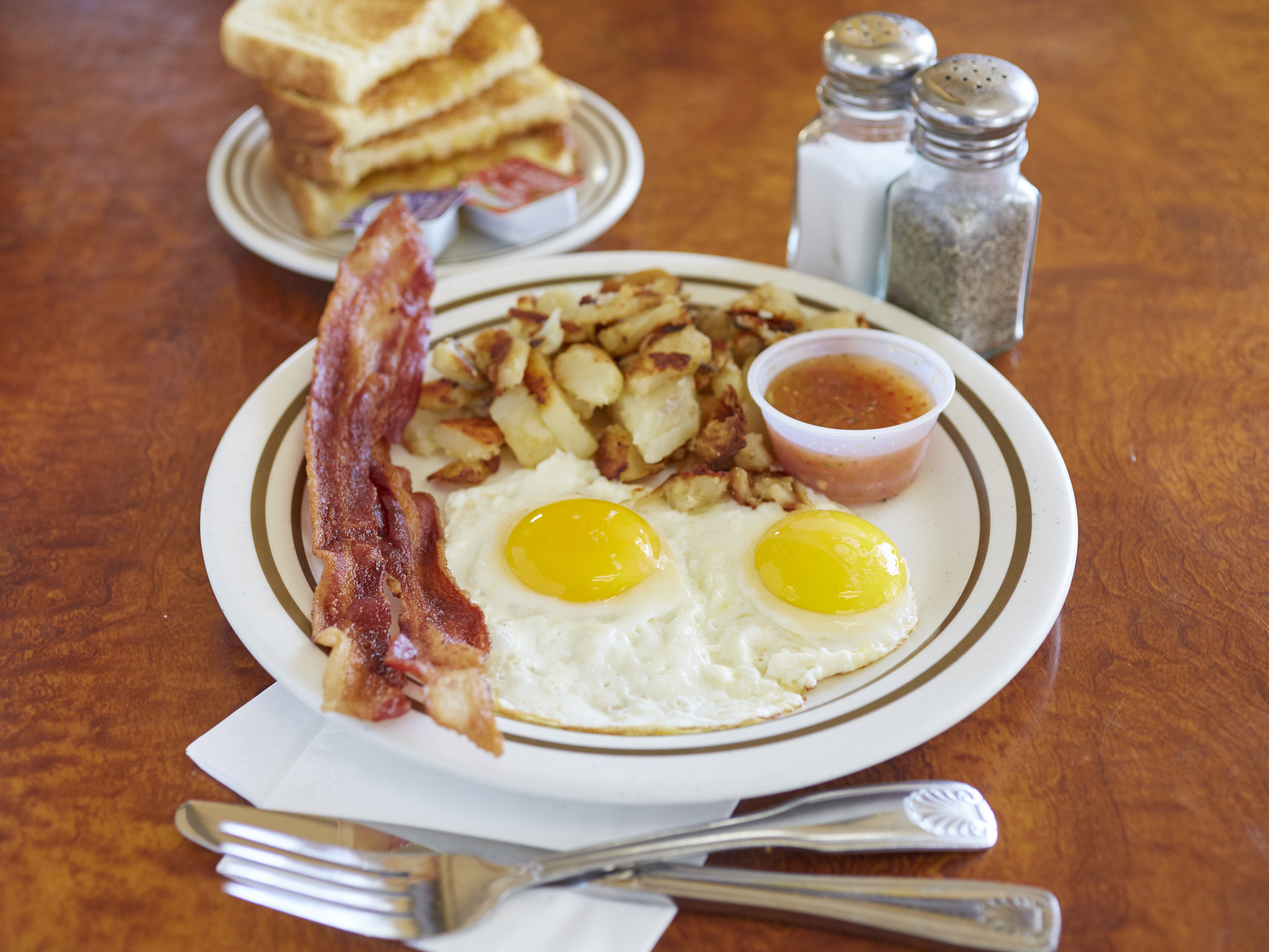 Order Special- 2 Eggs with 2 Bacon  food online from Breakfast Cafe store, Oak Park on bringmethat.com