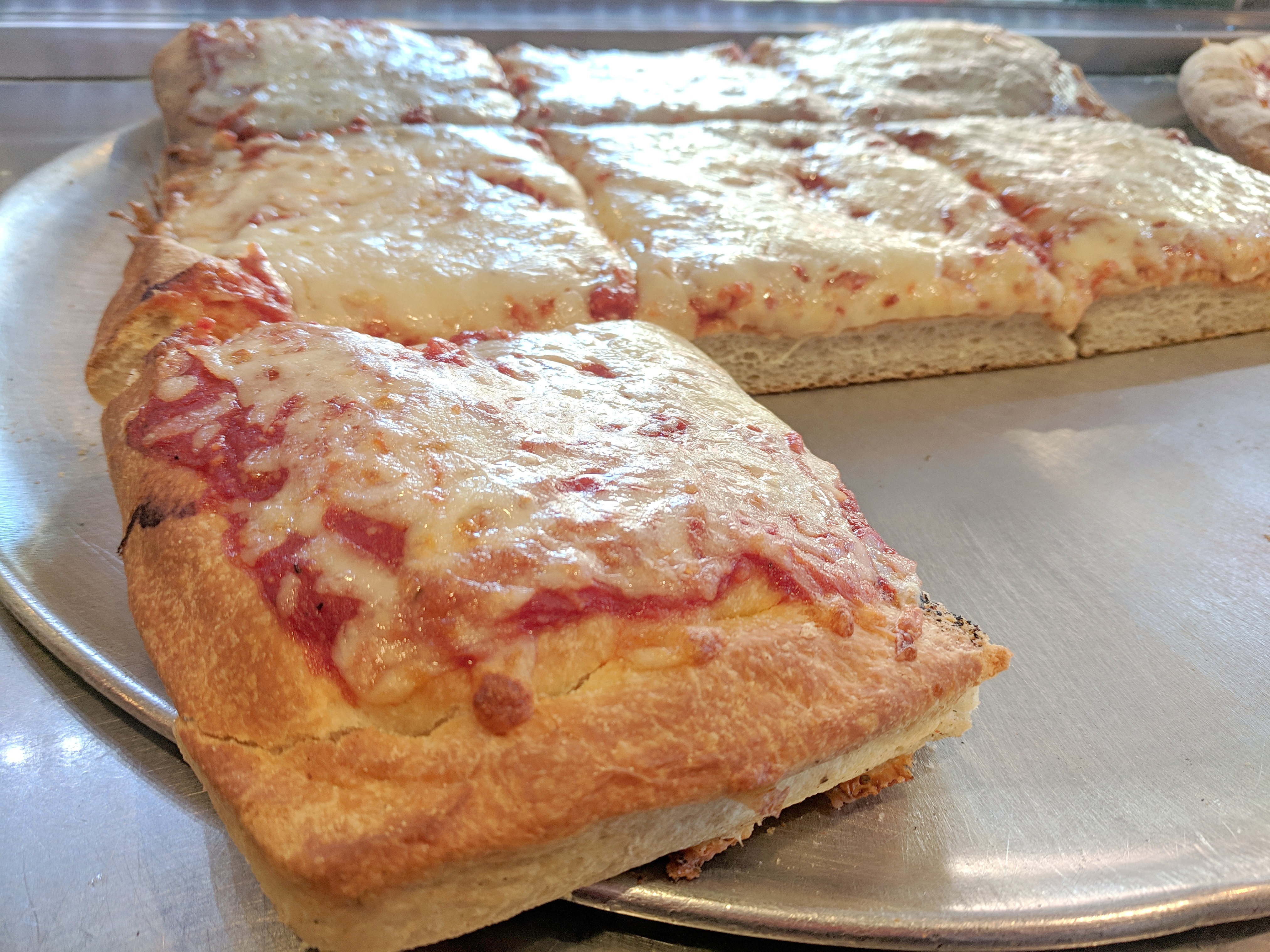 Order Sicilian Style Pizza food online from Famous famiglia pizza store, New York on bringmethat.com