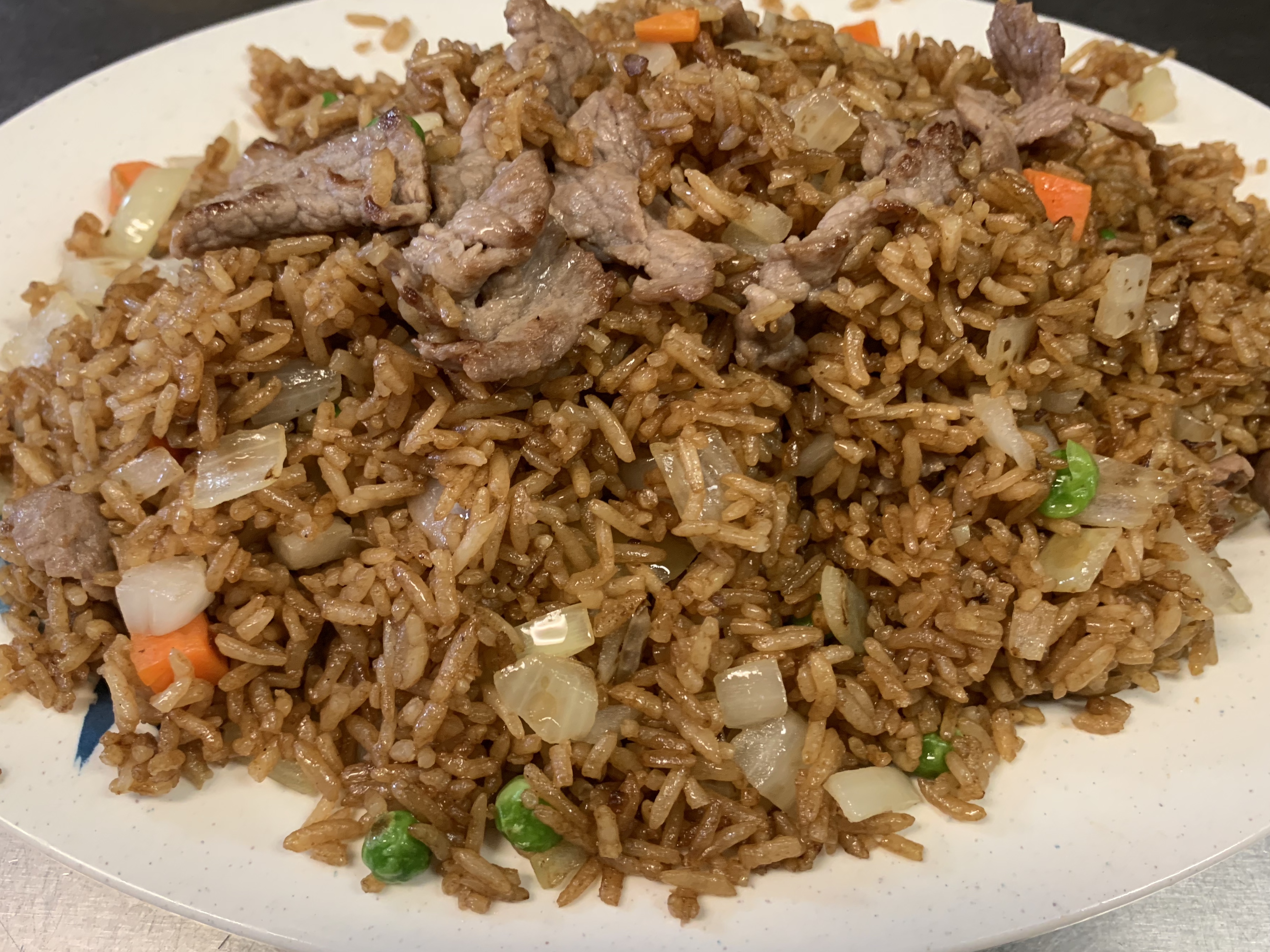 Order 15. Beef Fried Rice food online from Tsing Tao Chinese Cuisine store, Mesa on bringmethat.com
