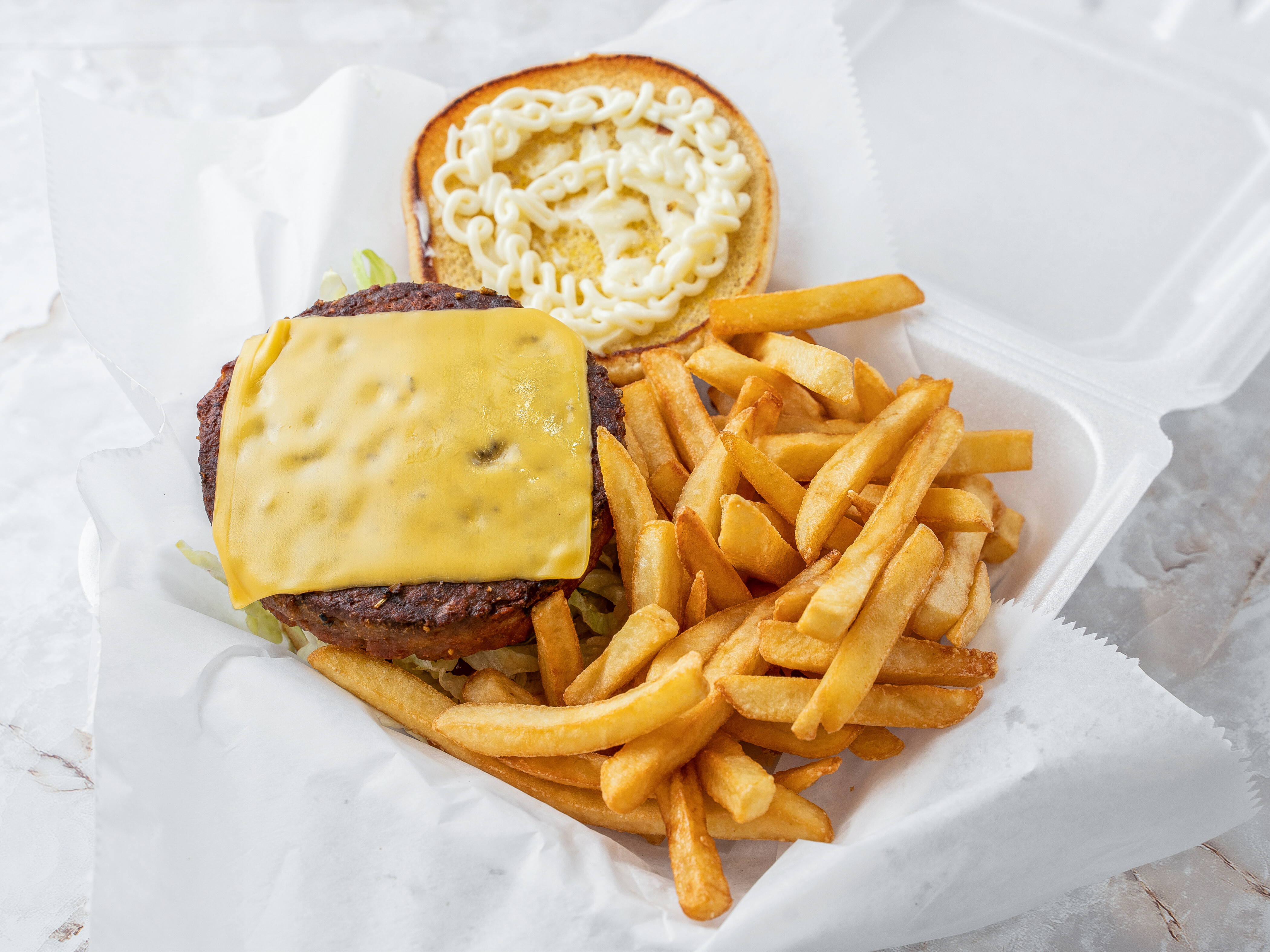 Order Cheeseburger food online from Noda Market & Deli store, Charlotte on bringmethat.com