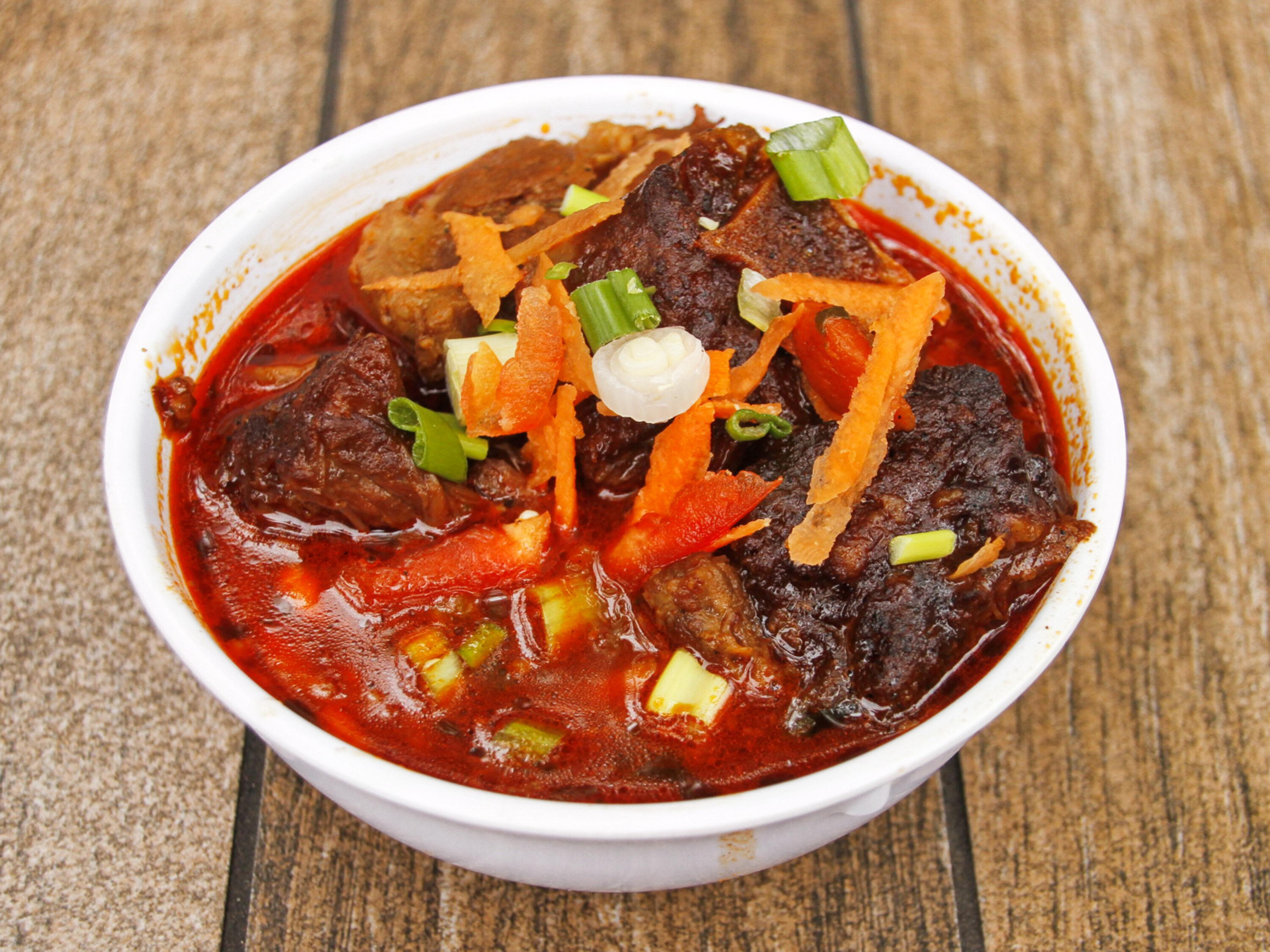 Order Stew Oxtail food online from Kaieteur Restaurant & Bakery store, Bronx on bringmethat.com