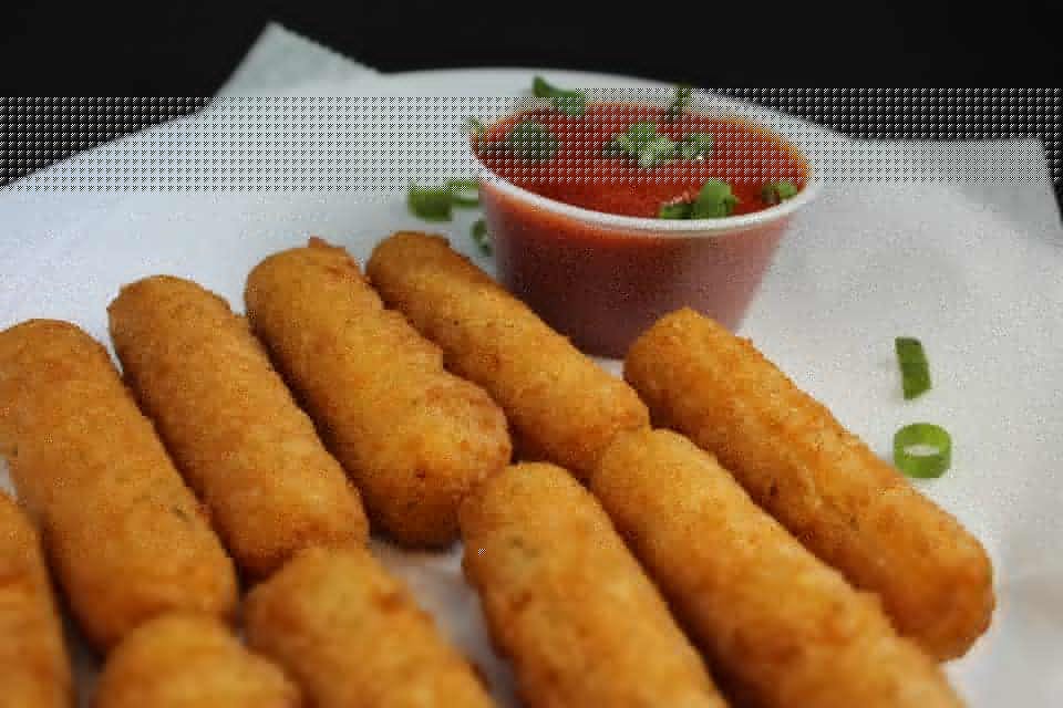 Order Mozzarella Sticks - 6 Pieces food online from Pizza Casbah store, Fort Collins on bringmethat.com