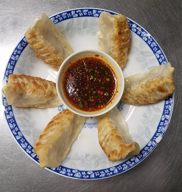 Order 15. Potstickers food online from Szechuan House store, Ames on bringmethat.com