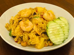 Order Pineapple Fried Rice food online from Tamarind Thai Cuisine store, Camarillo on bringmethat.com