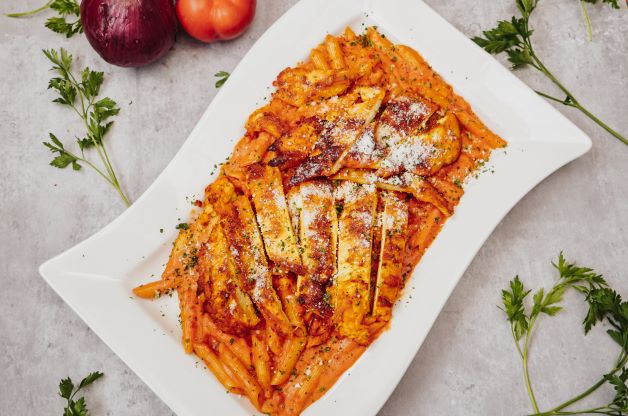 Order 4. Penne in Vodka Sauce with Chicken food online from Eli's Pizza Pasta store, Elizabeth on bringmethat.com