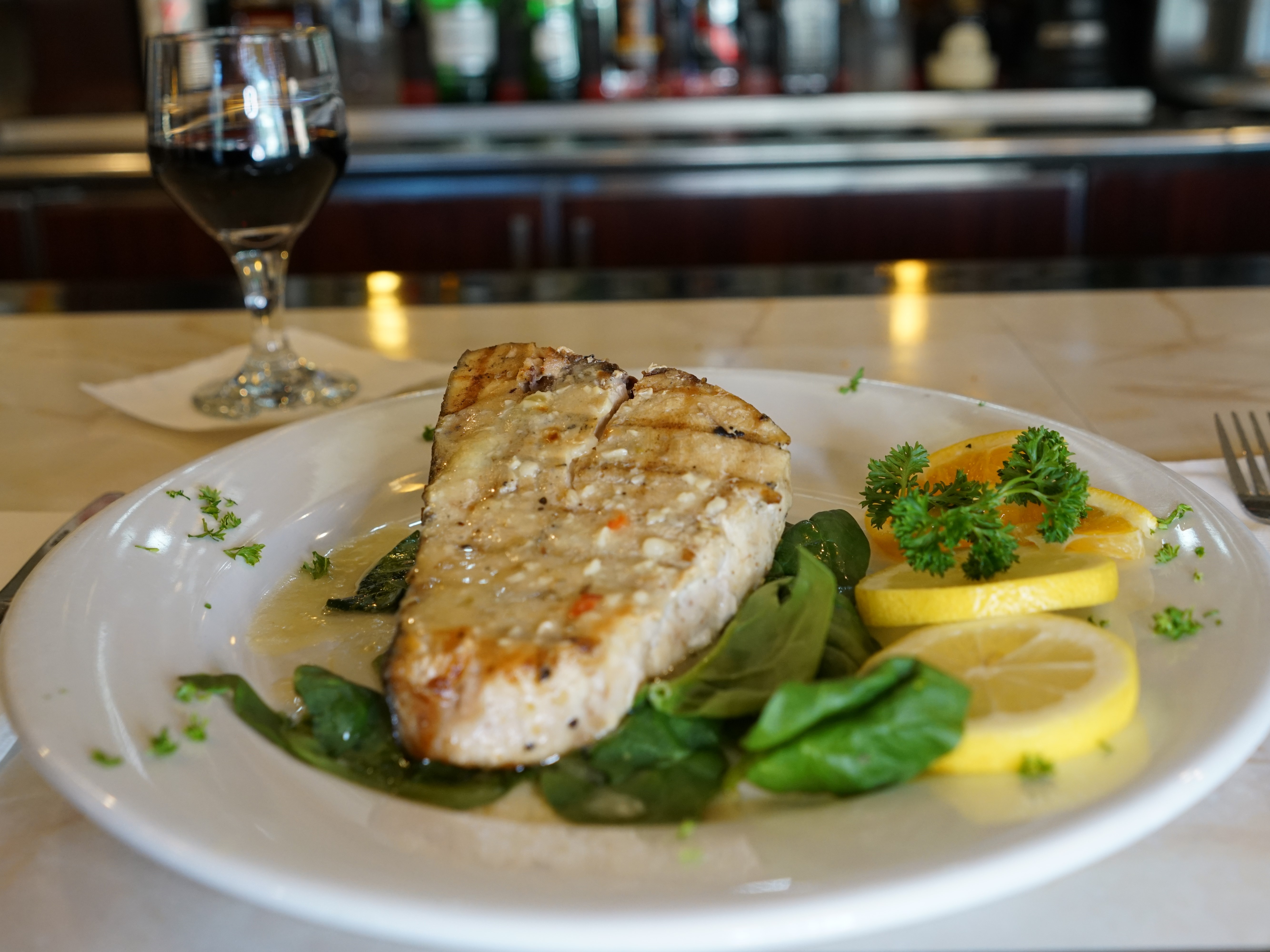 Order Grilled Sword Fish over fresh spinach food online from Fountain Diner store, Hartsdale on bringmethat.com