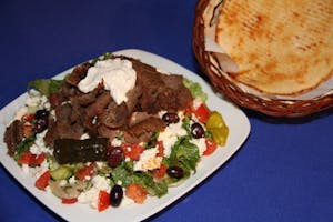 Order * Gyros Salad food online from Zorbas Fine Greek Cuisine store, Albuquerque on bringmethat.com