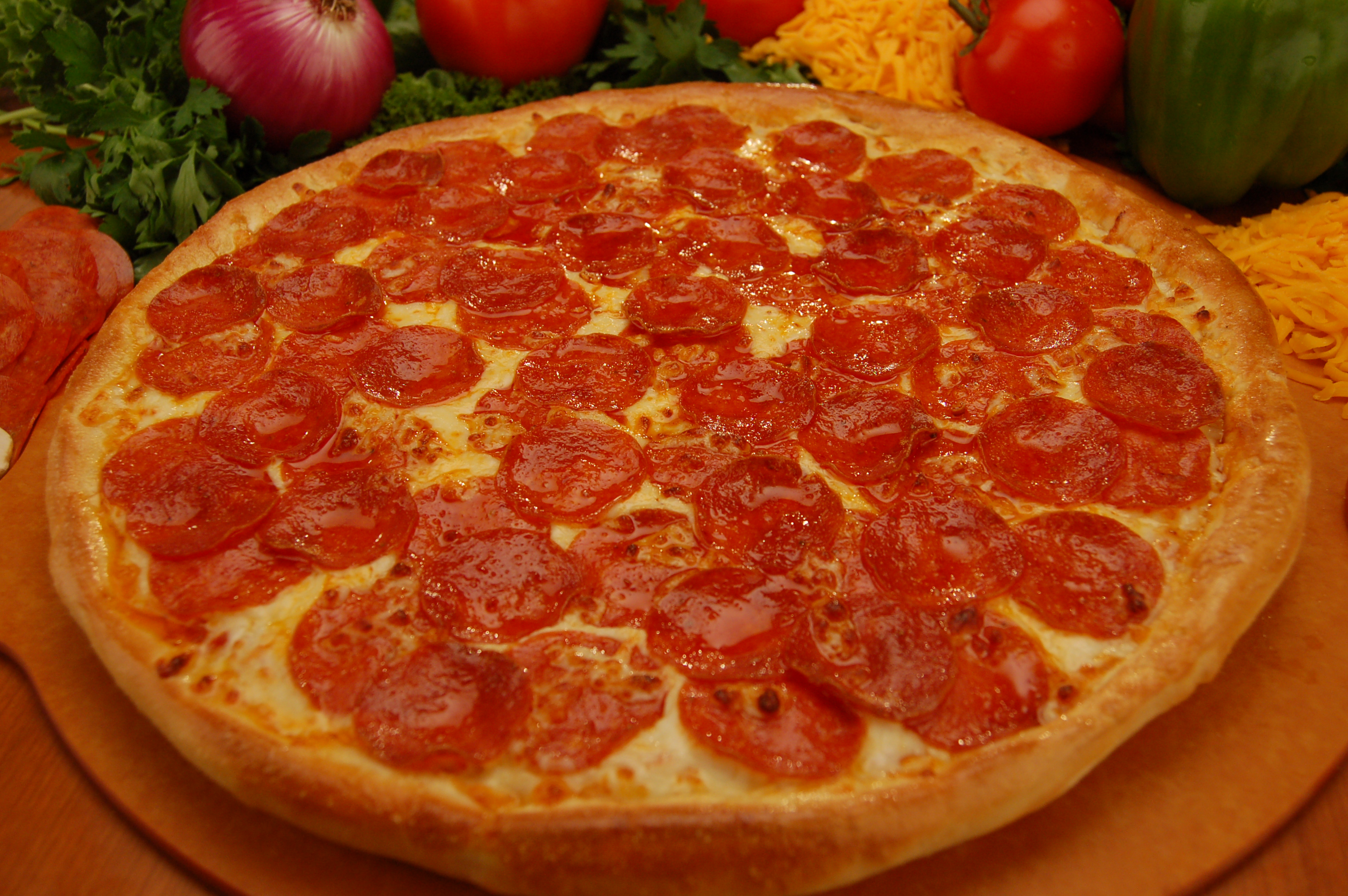Order One Topping Pizza food online from Cheezie Pizza store, Wichita on bringmethat.com