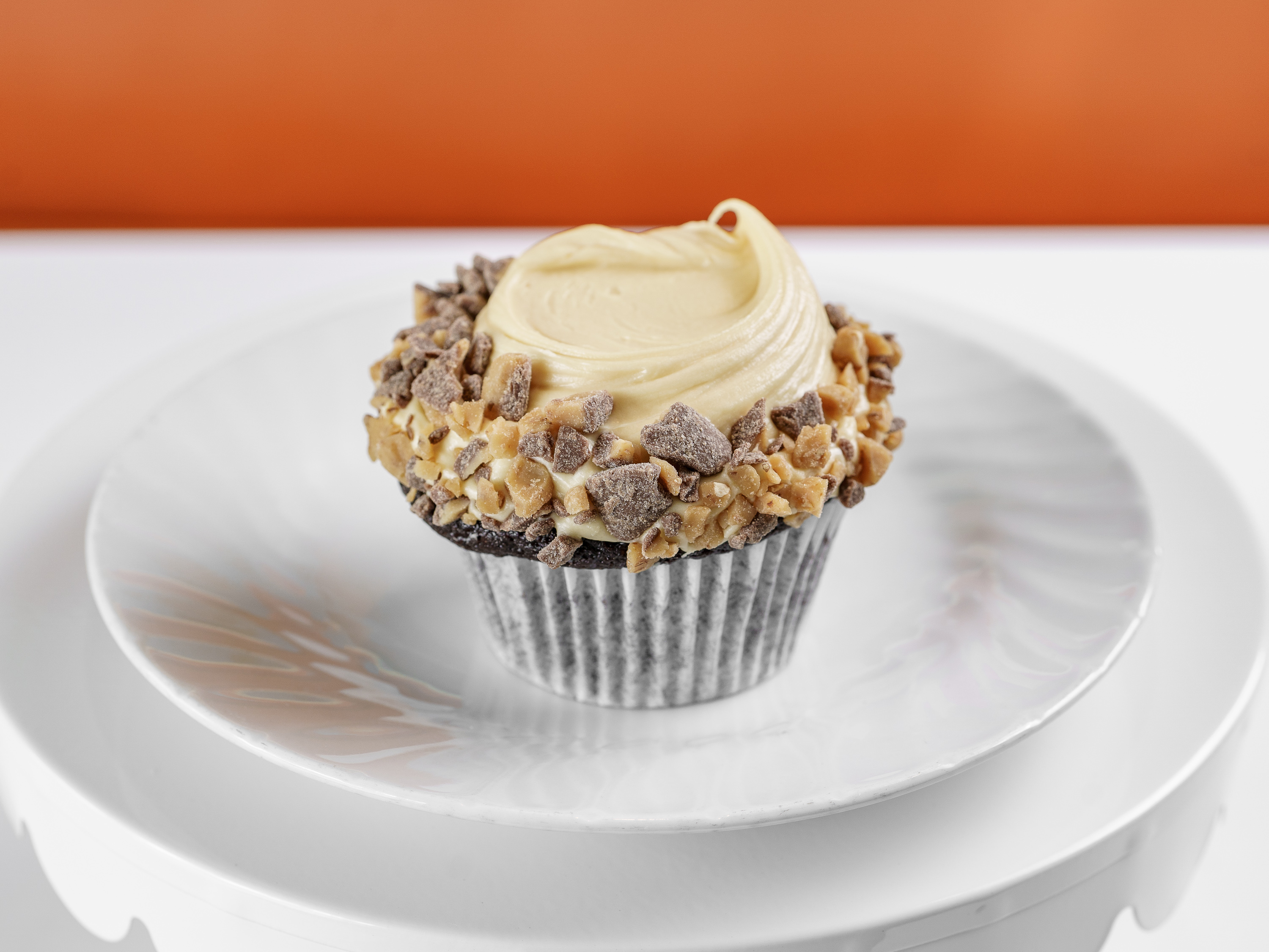 Order Chocolate / Caramel Toffee Buttercream Cupcake food online from Frosted Cupcakery store, Long Beach on bringmethat.com