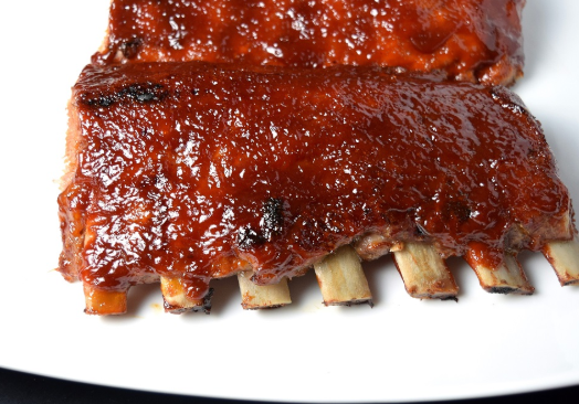 Order 1/2 Rack BBQ Baby Back Ribs food online from Court Jester Restaurant store, Freehold on bringmethat.com
