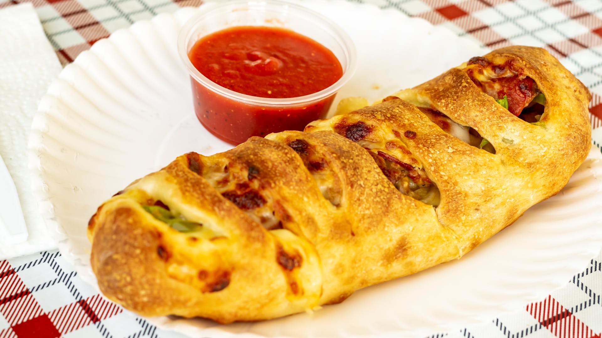 Order Stromboli - Stromboli food online from Palermo Pizza & Subs store, Hannibal on bringmethat.com