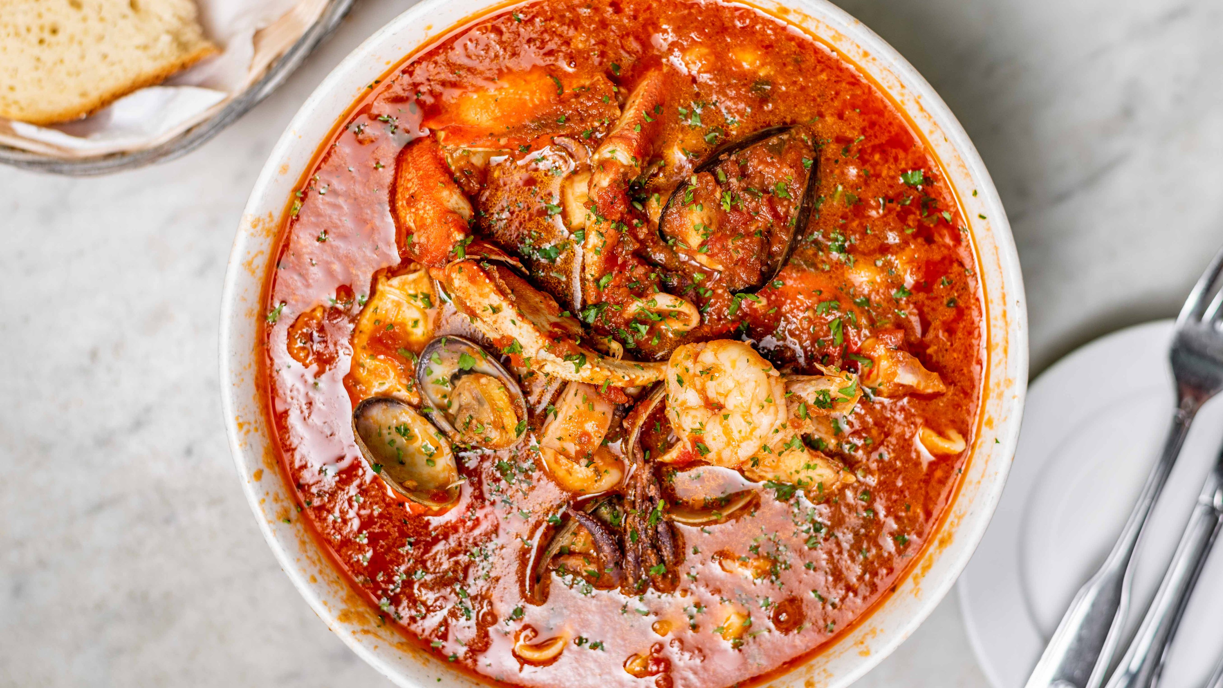 Order The Best Damn Crab Cioppino food online from Sotto Mare Oysteria & Seafood store, San Francisco on bringmethat.com