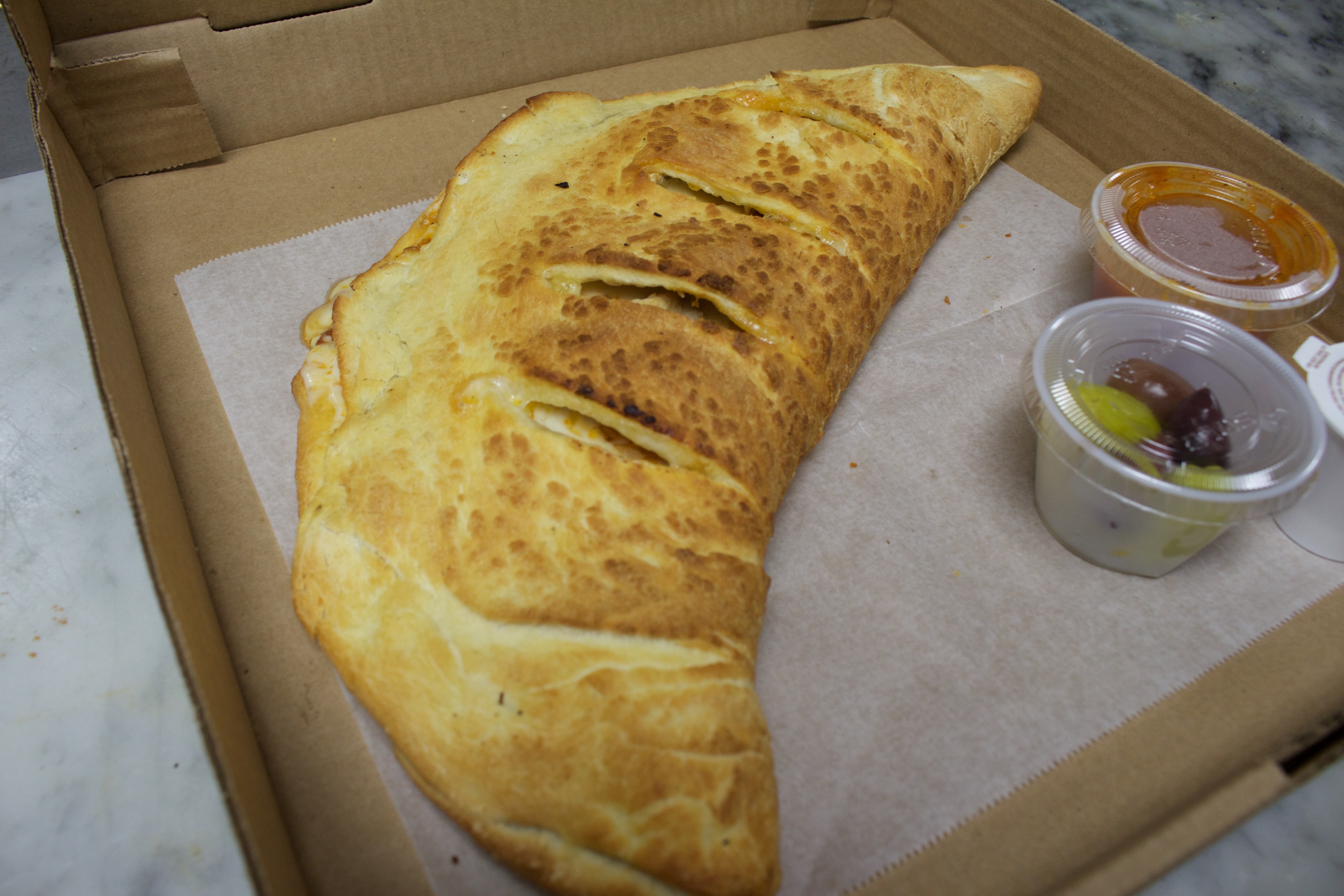 Order Buffalo Chicken Stromboli food online from Pizza Palace store, Cockeysville on bringmethat.com