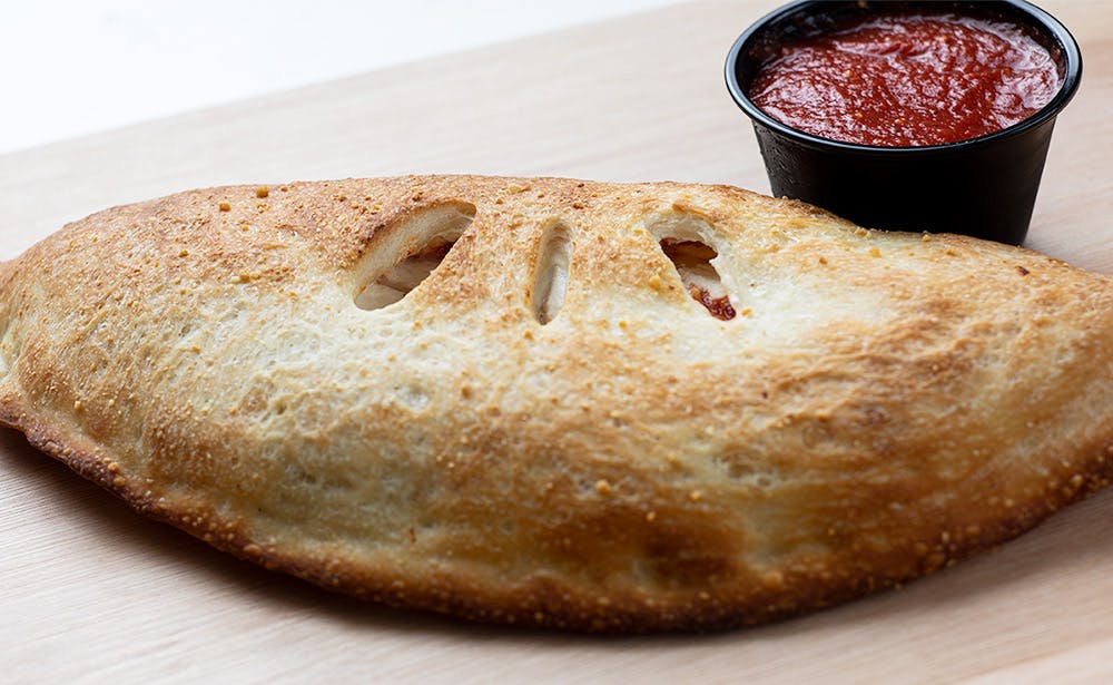 Order Supreme Calzone - Calzone food online from Calz Pizza store, Norfolk on bringmethat.com