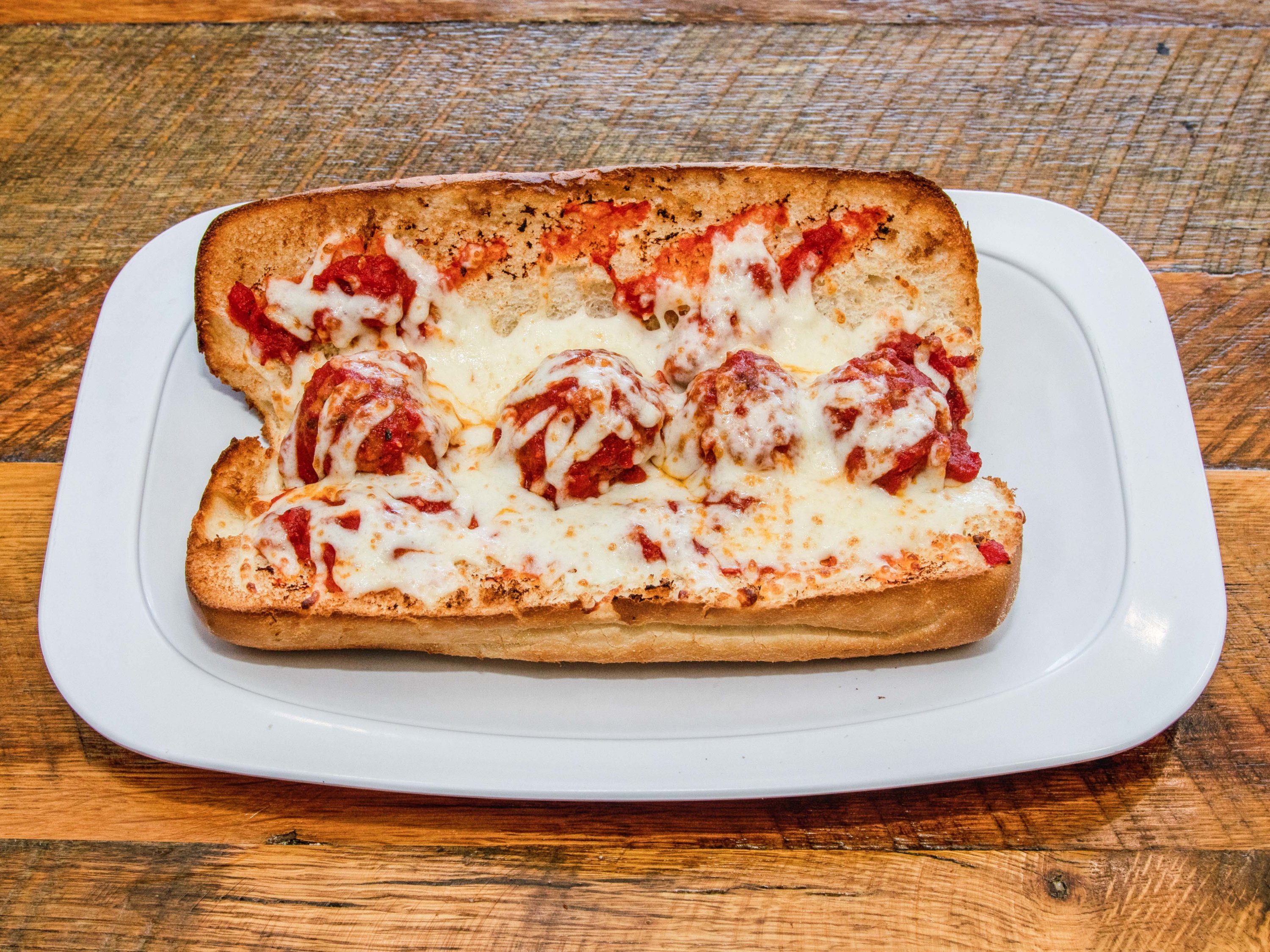 Order Meatballs Sub food online from Duccinis Pizza store, Falls Church on bringmethat.com