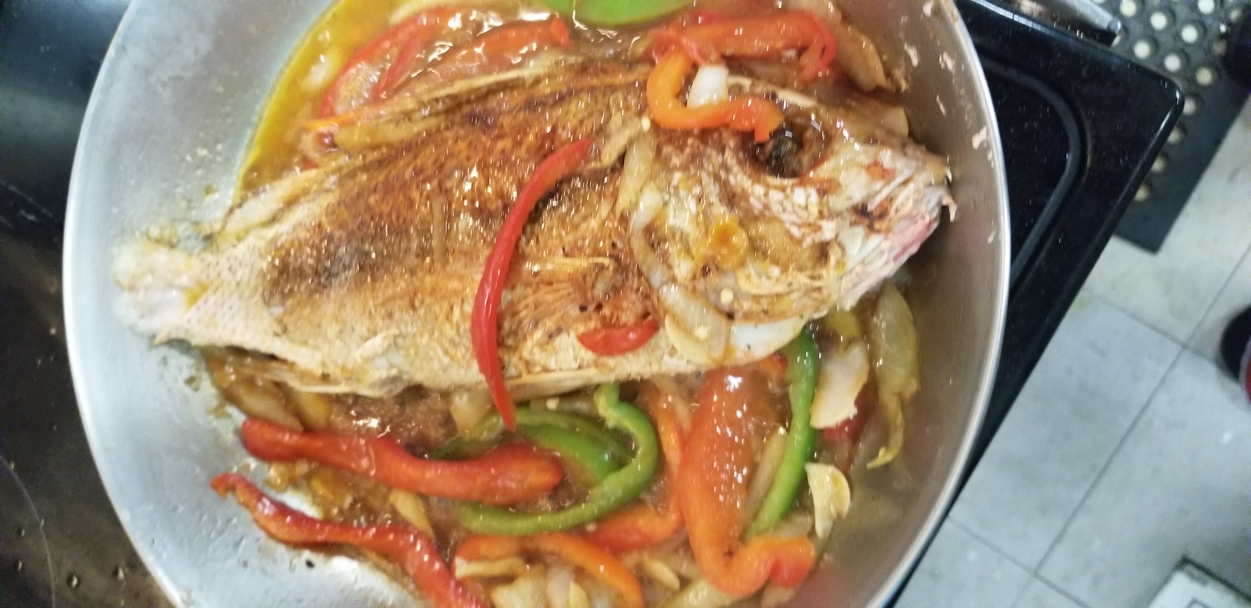 Order Red Snapper food online from Huzzys Jamaican Restaurant store, Houston on bringmethat.com