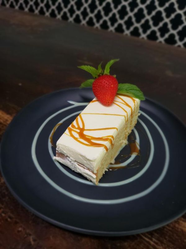 Order Tres Leches Cake food online from Dulce De Leche Cafe store, Chicago on bringmethat.com