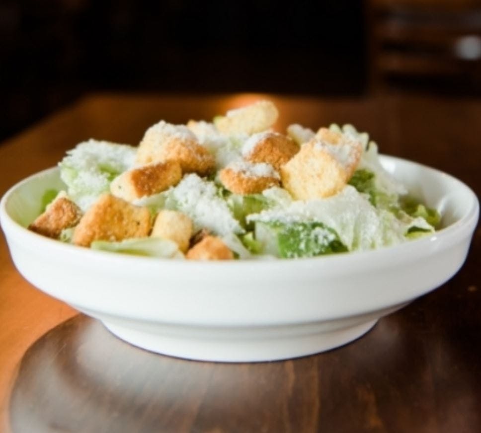 Order Caesar Salad - Side food online from Jonny Pizza store, Fort Worth on bringmethat.com