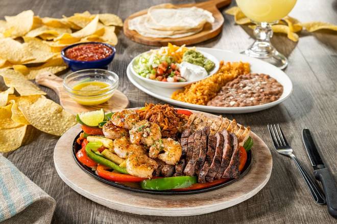 Order The Ultimate Fajita food online from On The Border - Woodland store, Kentwood on bringmethat.com