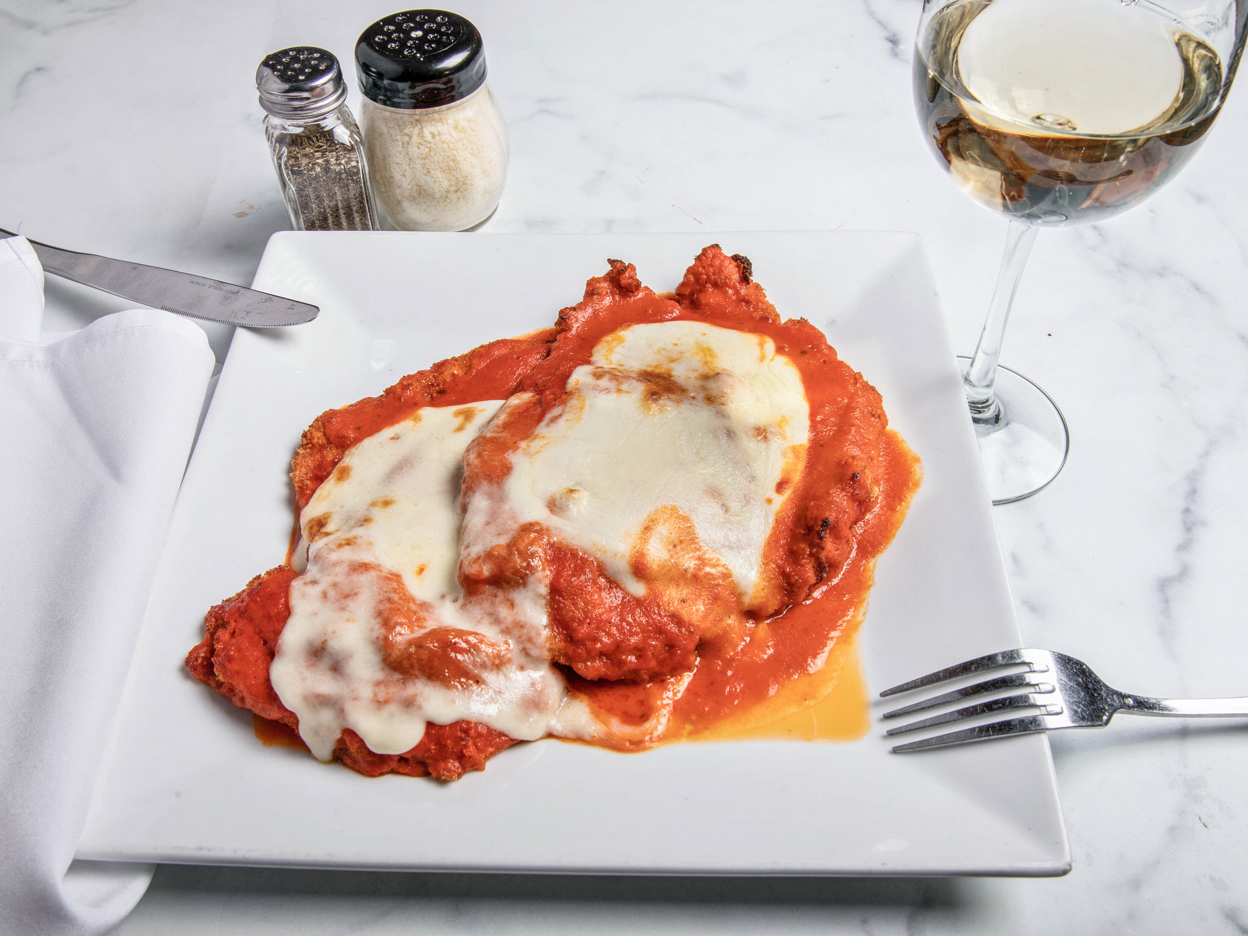 Order Chicken Parmigiana food online from Cafe Spiga store, Mount Sinai on bringmethat.com