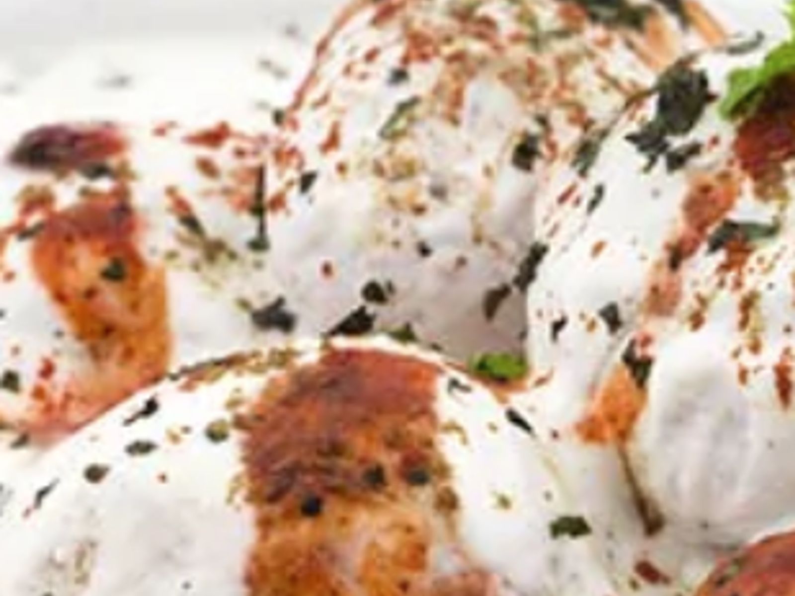 Order Dahi Vada Chaat (served cold) food online from Curry Home store, Pittsburgh on bringmethat.com