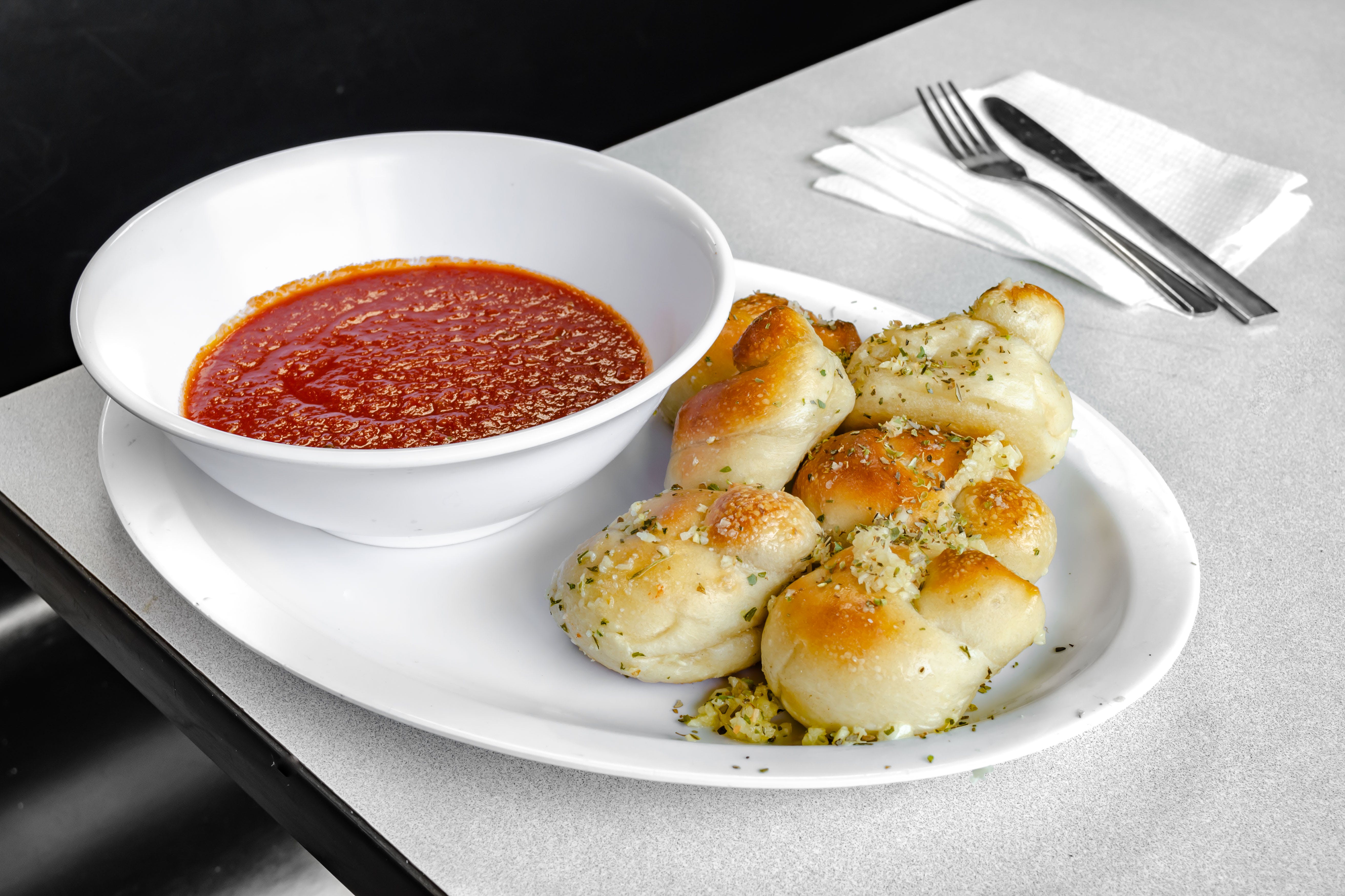 Order Garlic Knots - 6 pieces food online from TJ's Pizza store, Asbury Park on bringmethat.com
