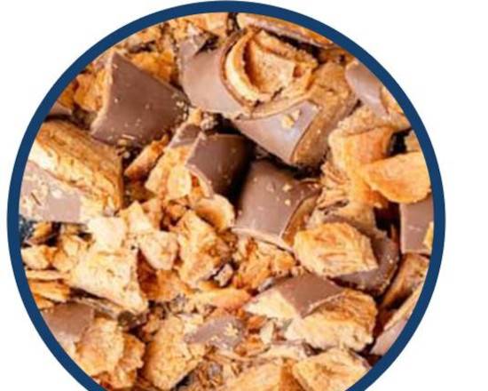 Order 1/3 CUP Butterfinger food online from Bruster Real Ice Cream store, Athens on bringmethat.com