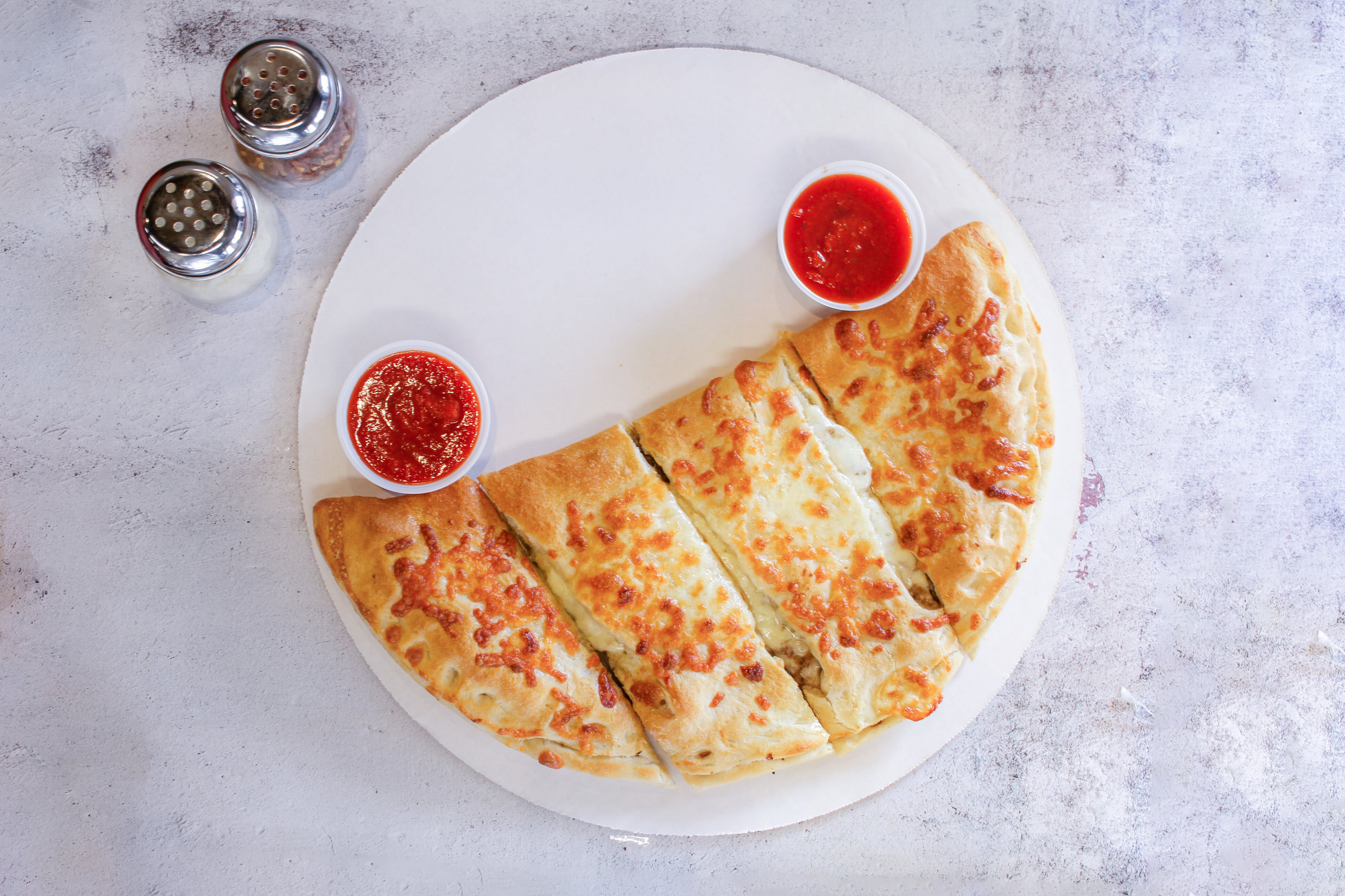 Order Cheese Calzone - Small food online from Atlas Pizza store, Worcester on bringmethat.com