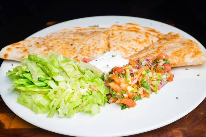 Order Quesadilla food online from Tropical Cuisine store, Collegedale on bringmethat.com