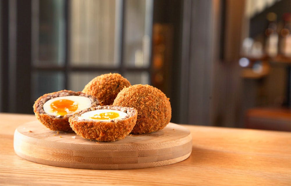 Order Scotch Egg - Pastries food online from Kensington Pies store, East Meadow on bringmethat.com