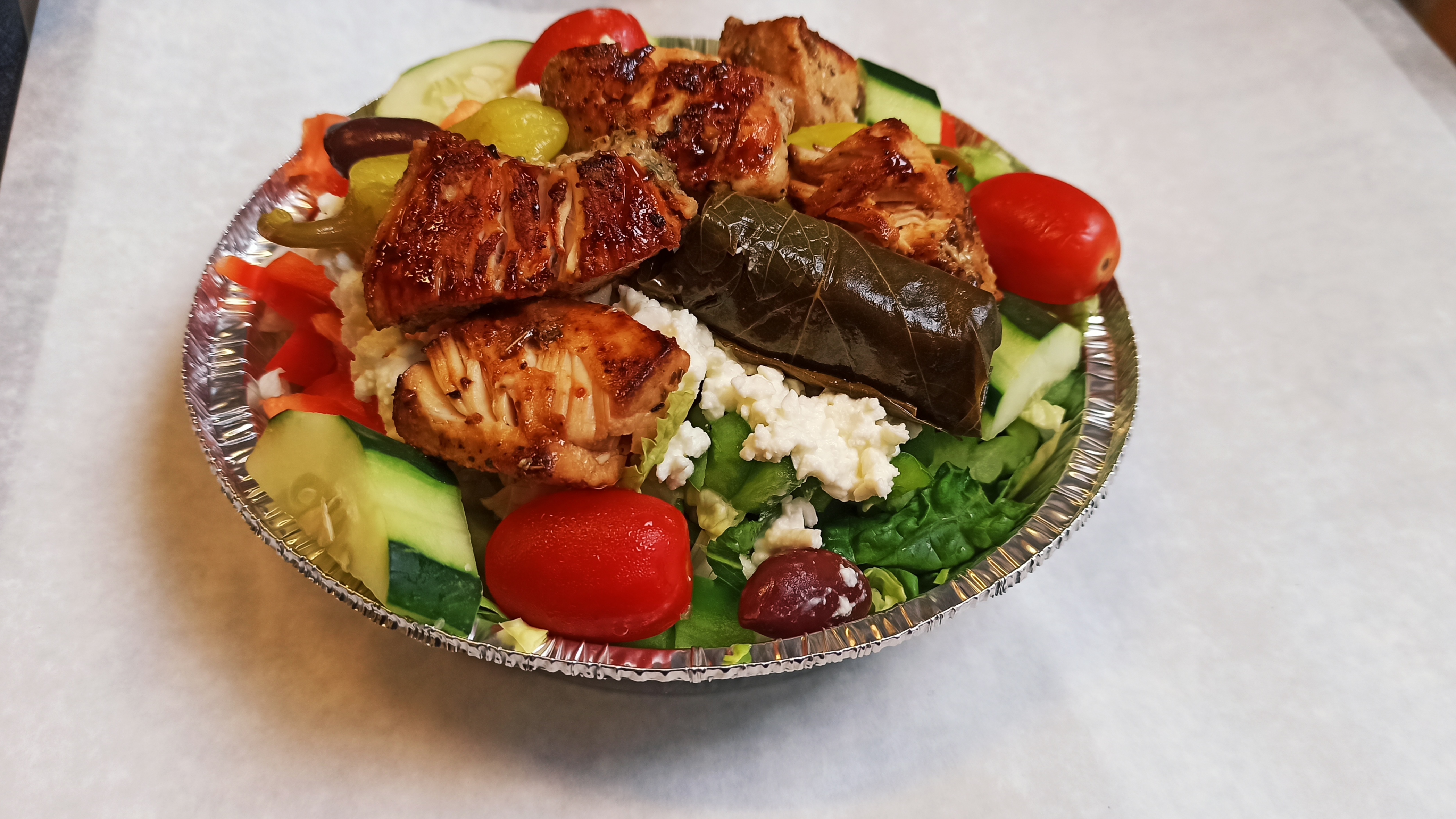 Order Small Greek Salad with Chicken food online from Papa Juan Deli store, Miller Place on bringmethat.com