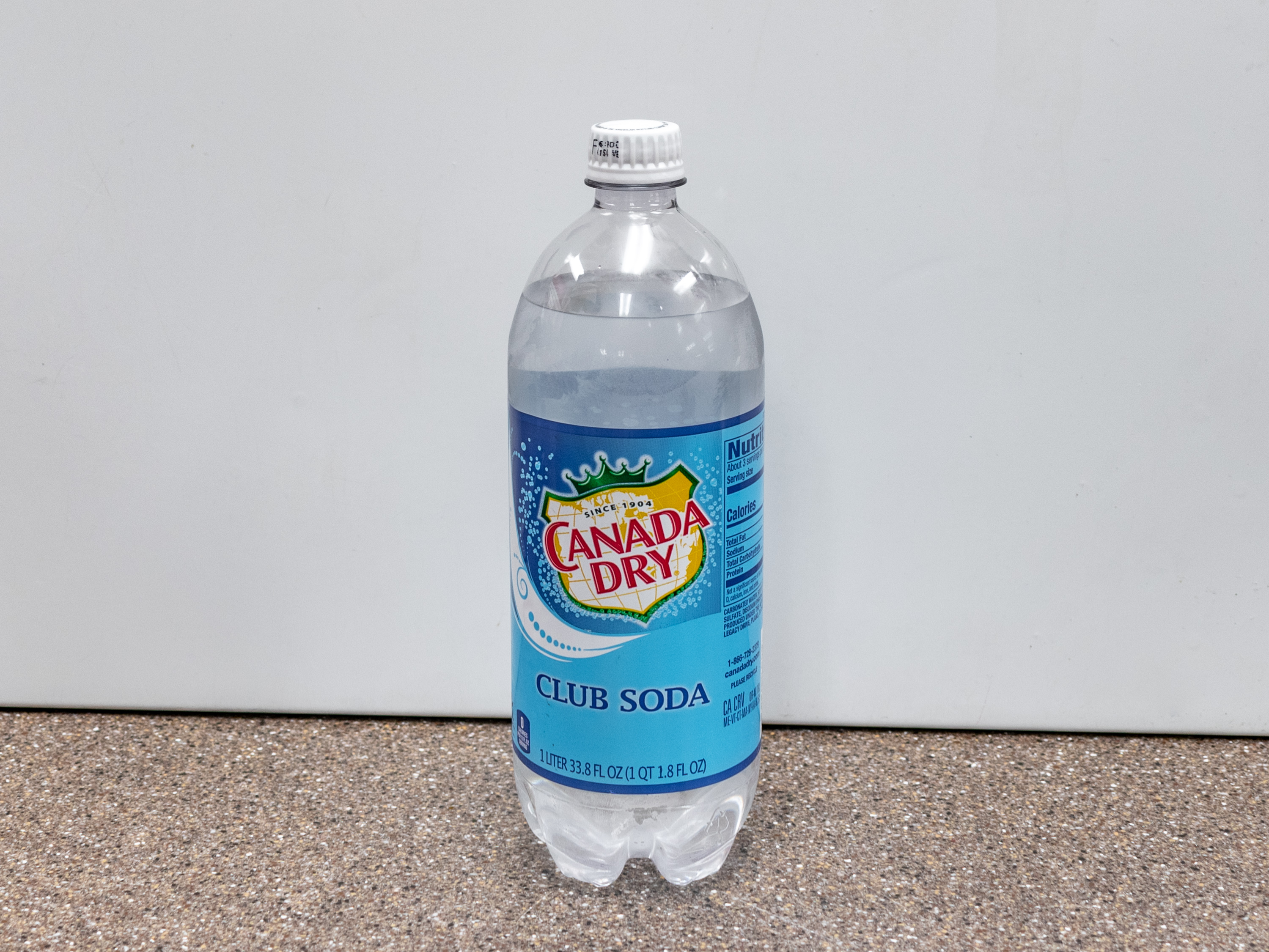 Order Canada Dry Club Soda food online from Kangaroo Food Mart store, Cathedral City on bringmethat.com