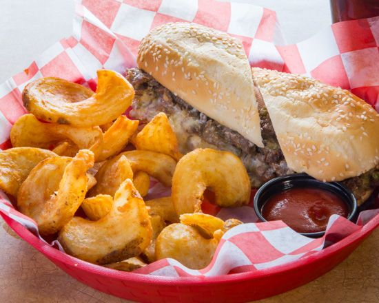Order Philly Cheesesteak food online from Dawg House Bar & Grill store, Macon on bringmethat.com