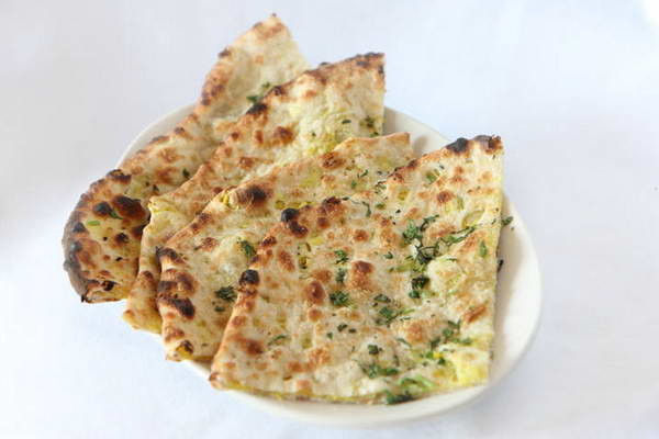 Order Onion Kulcha food online from The indian kitchen store, West Hollywood on bringmethat.com