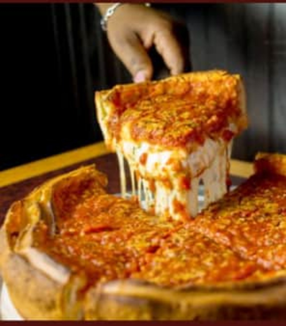 Order Small Deep Dish Meat Eater's Deluxe. food online from PizzaPapalis store, Bloomfield Hills on bringmethat.com